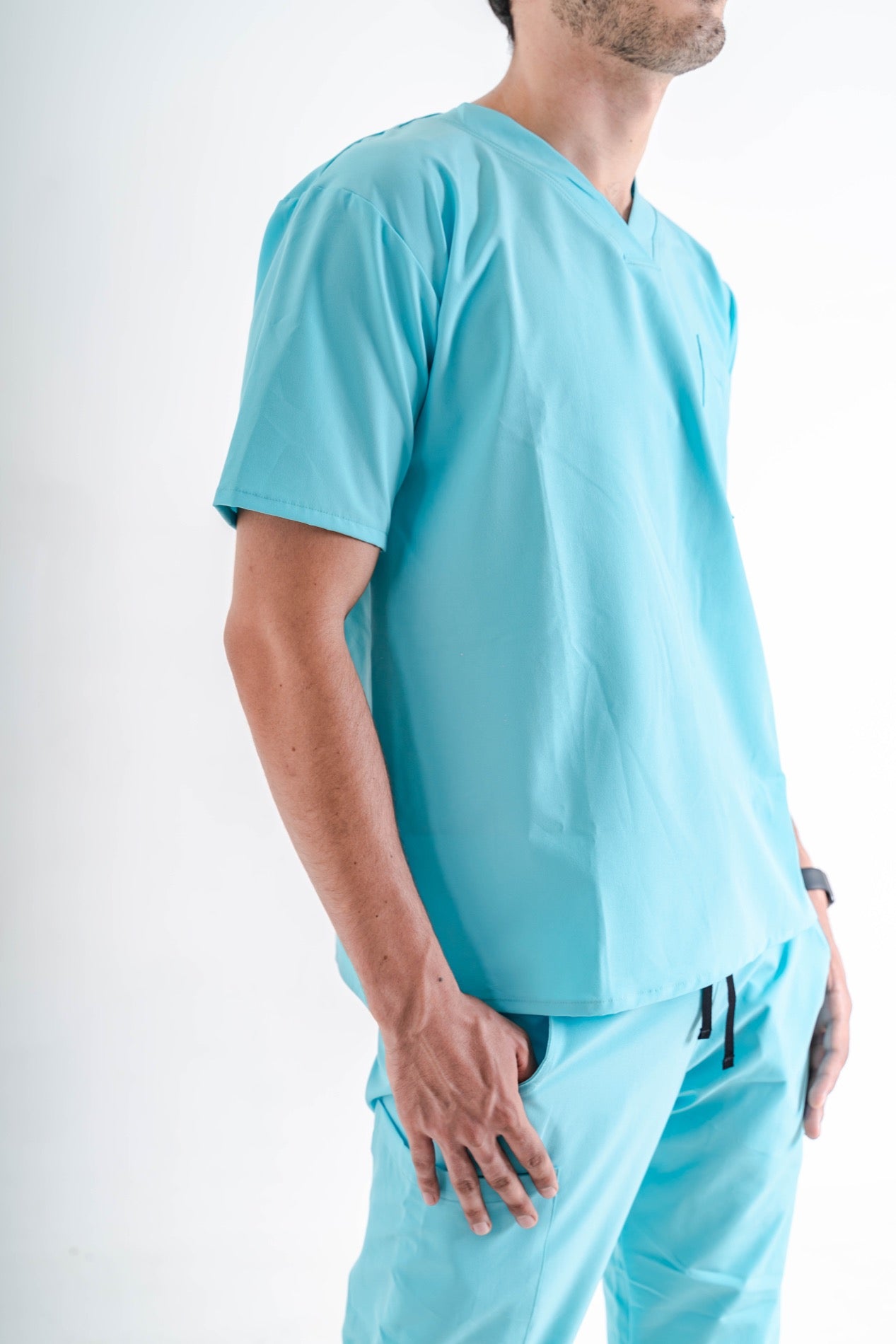 Scrub conjunto cuello v azul turqueza